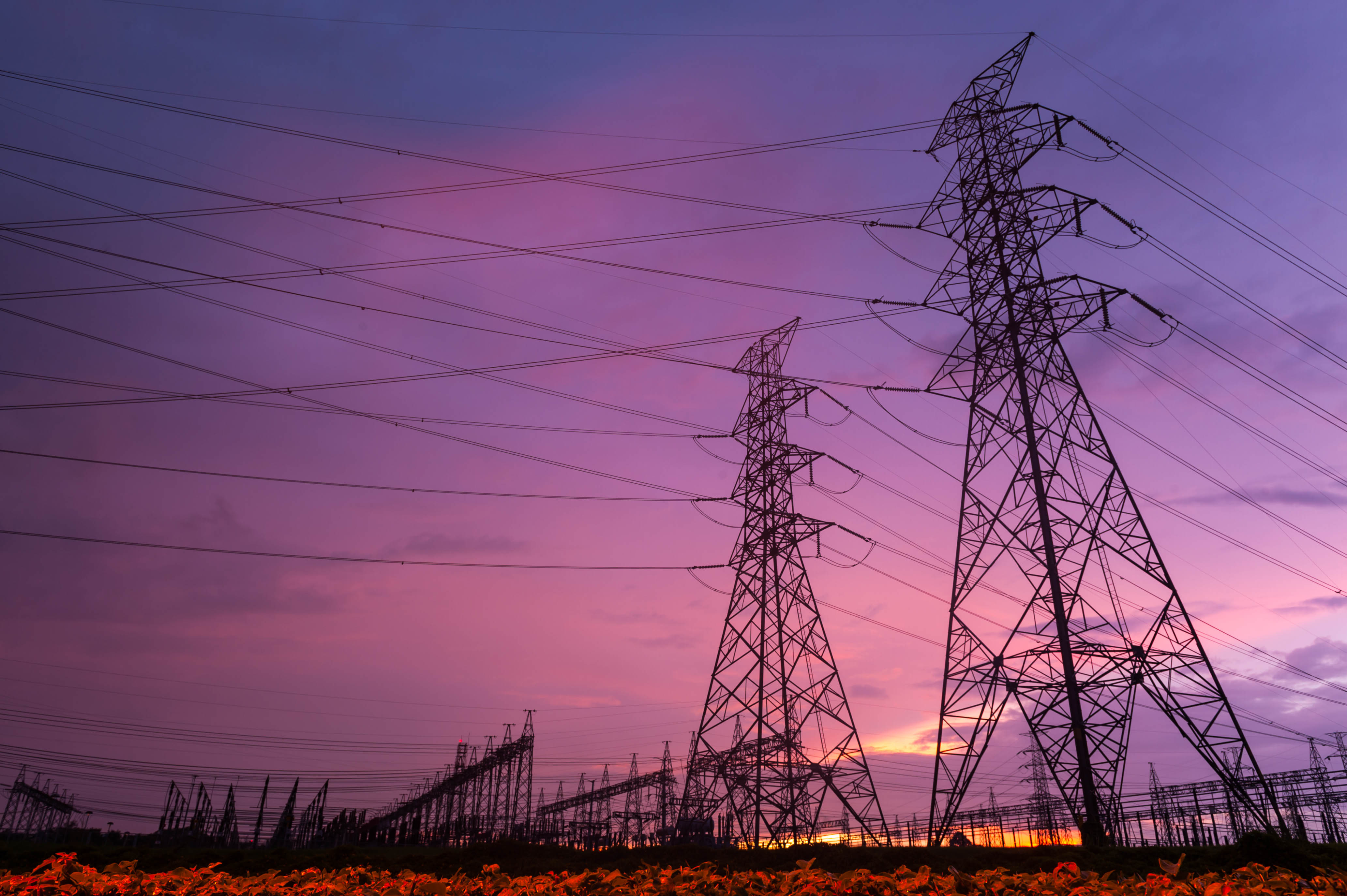 Sunset over a Silhouette electrical substation