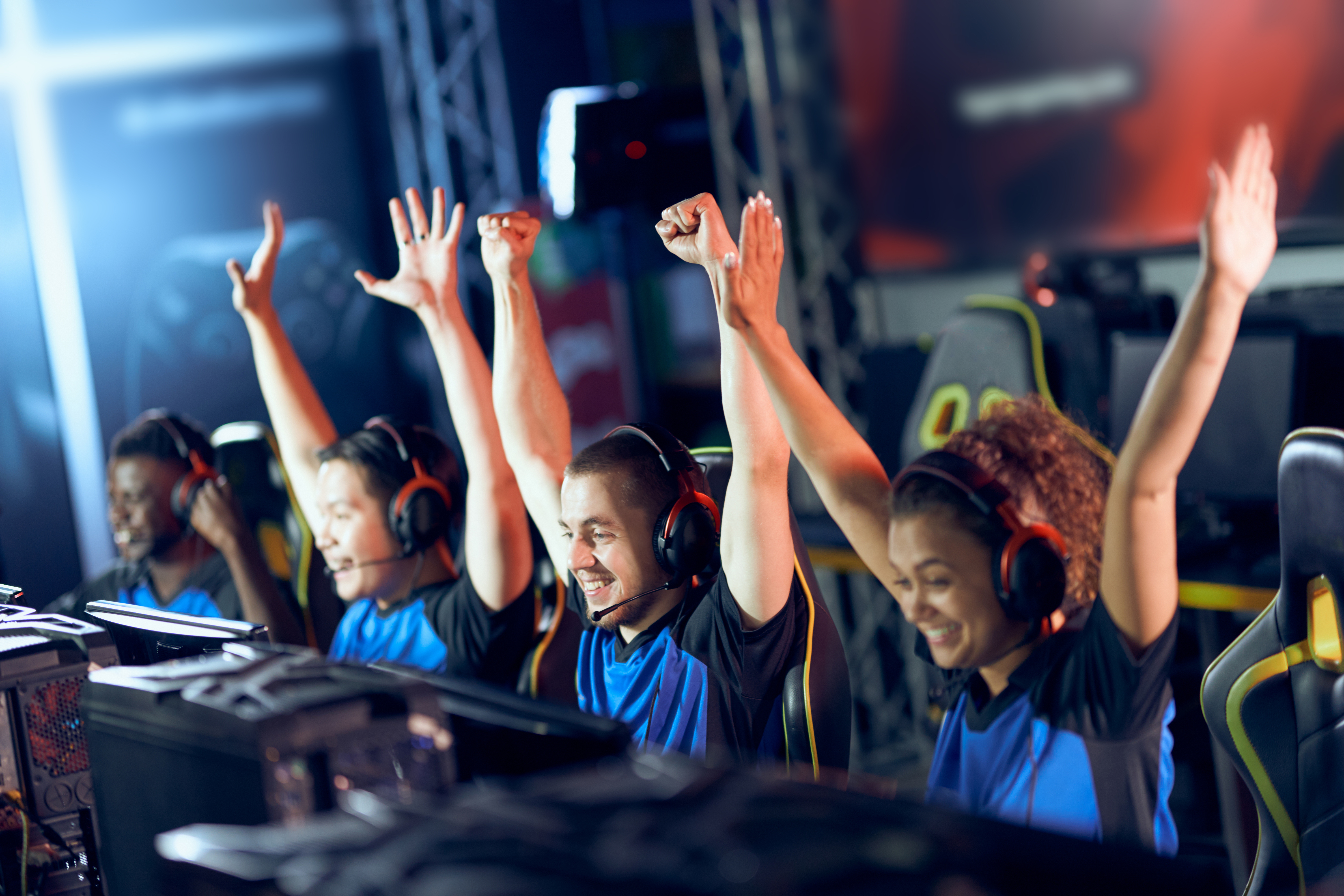 Team,Of,Happy,Professional,Cyber,Sport,Gamers,Celebrating,Success,While