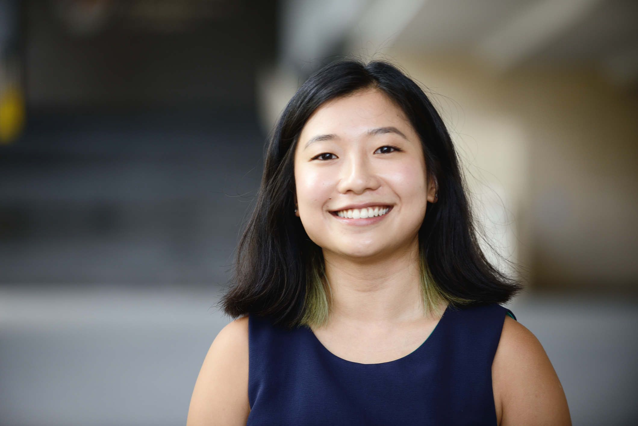 Outdoors portrait of a young chinese professional woman