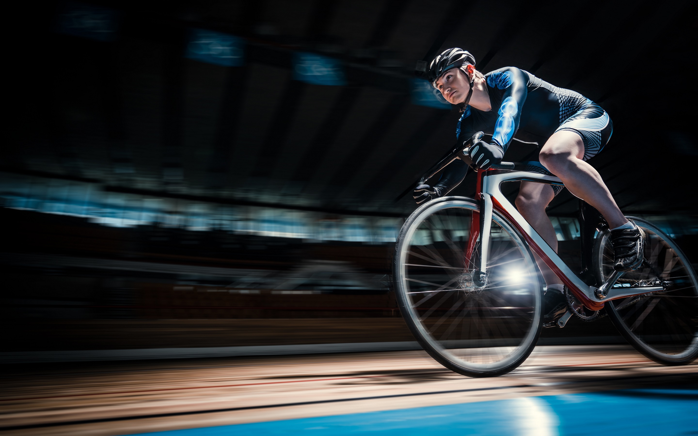 Racing cyclist on velodrome